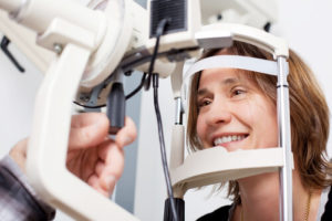Woman receiving an eye exam